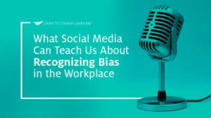 image with microphone and lead with that podcast episode title, Lead With That: What Social Media Can Teach Us About Recognizing Bias in the Workplace