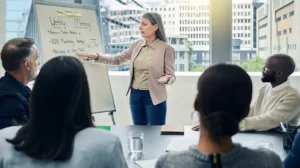 a woman leads a team meeting