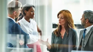 People discussing how succession planning training helps you build a dynamic plan for the future and evolve your organization's approach to succession planning and leadership development to focus on readiness