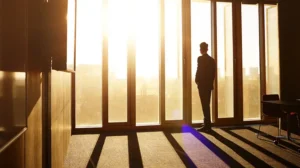 A business professional considers the importance of hope at work