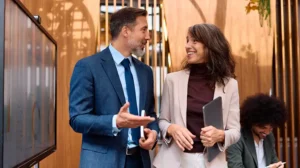 Two professionals discussing leadership and storytelling